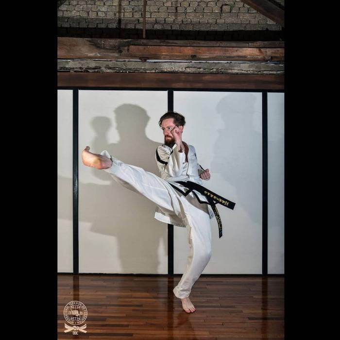 Sanko Lewis performing a middle twisting kick in Seoul, Korea