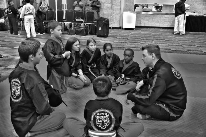 Team pep talk prior to AKA Warrior Cup