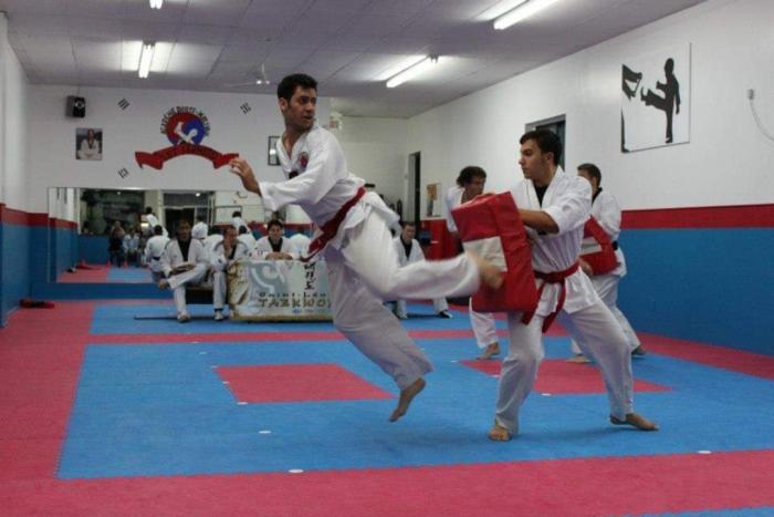 Red belt · May 1, 2011 · Promoted by Masters Mike Carrieri and Alex Naud