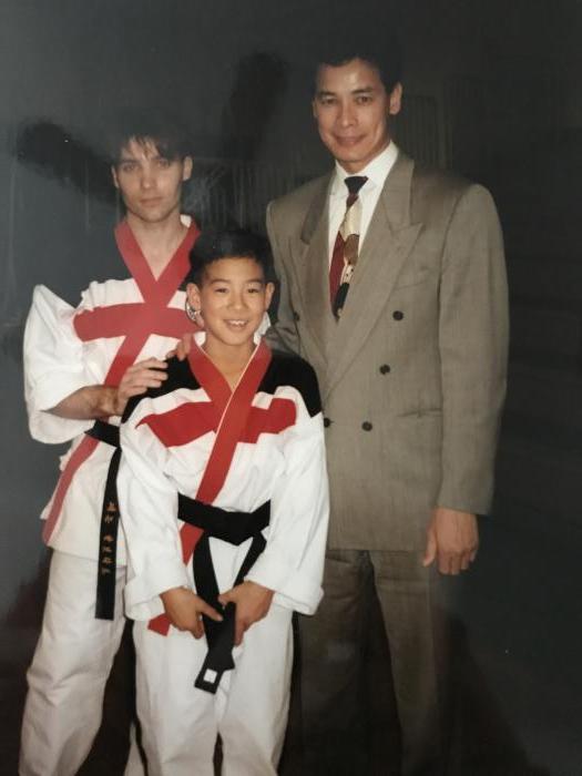 Master Jay Warwick and I with a student just after a black Belt graduation.