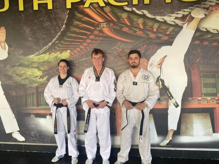 Photo of me and my instructors grandmaster John ivanov and master Renee nightingale